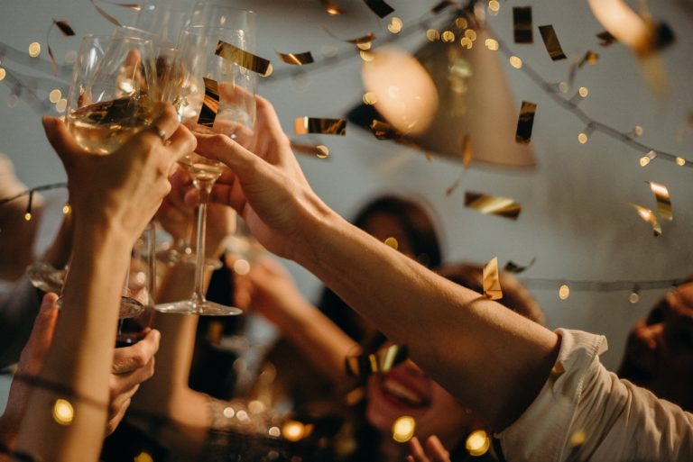 people toasting wine glass